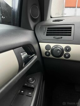 Opel astra H 1.9CDTI - 7