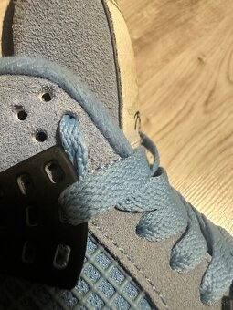 Jordan 4 University Blue - 7