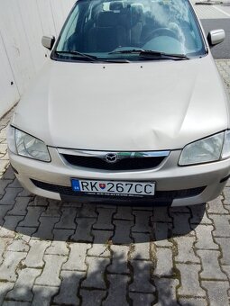 Mazda 323f-bj - 7