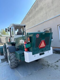 Predam nakladac UNK 320 - 7