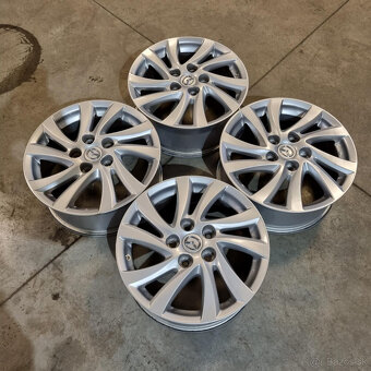 Mazda disky 5x114,3 R16 6,5J ET52.5 - 7