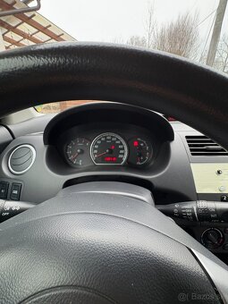 Suzuki Swift 1.3i - 7