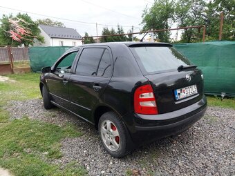 Škoda Fabiu 1.2 benzín 47Kw r.v2003 - 7