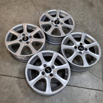 Hliníkové disky 4x100 R14 5,5J ET35 - 7