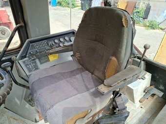 CATERPILLAR 428B 4X4 - 7