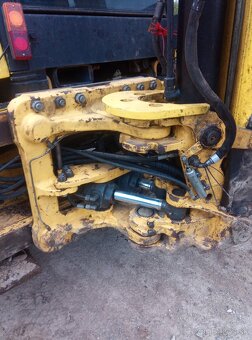 New Holland LB115B - 7
