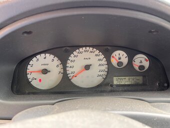 predam Nissan Almera - 7