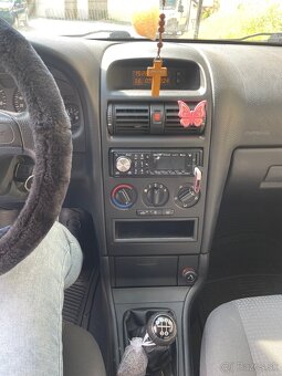 Opel astra 1,4 - 7