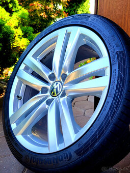 alu R18 5x112 orig. VW Passat, pneu 235/40 - 7