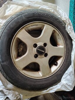 Mazda 323BJ 1.3 - 7