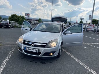 Opel astra H caravan - 7