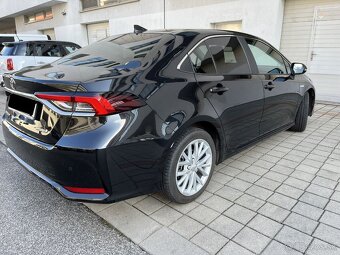 Toyota Corolla sedan 1.8 Hybrid e-CVT Comfort Tech Style - 7