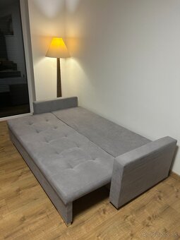 Rozkladací gauč s úložným priestorom + taburetka - 7