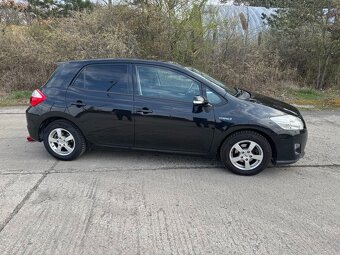 Auris Hybrid 1,8 - 7