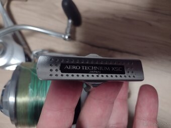 Predám Shimano aero technium 10 000 xsc + 2 nahradné cievky - 7