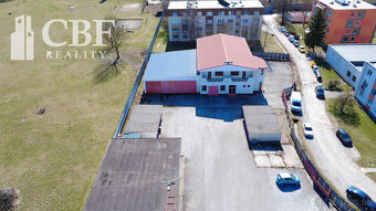 Na predaj priemyselný areál s admin. budovou a garážami v Ro - 7