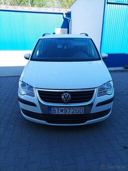 Touran 7 mesta 77kw - 7