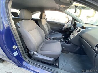 Opel Corsa D 1,2 - 7
