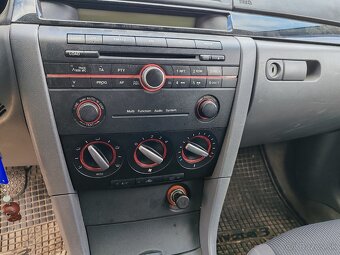 Mazda 3 1.4 benzín  62kw - 7