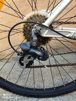 Bicykel trekingovy felt qx 65 - 7