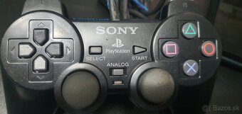 PlayStation 2 Slim - 7