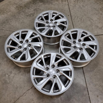 Hliníkové Mitsubishi disky 5x114.3 R16 6,5J ET38 - 7