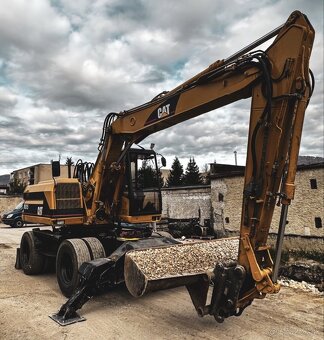 Bager CAT M315 - 7