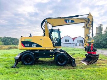 Kolesové rypadlo Caterpillar M315D - 7