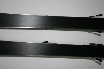 lyže Rossignol 167 cm drevene jadro , titan, DIN 12 - 7