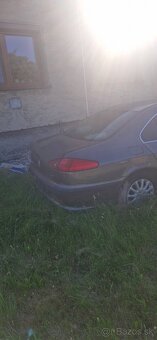 Peugeot 607 a Kia rio - 7
