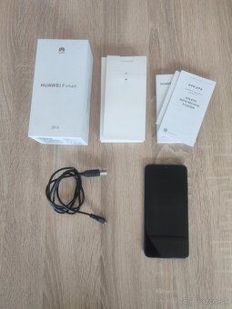 Huawei P Smart 2019 3/64gb - 7