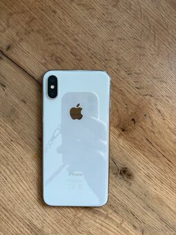 Apple iPhone XS - 7