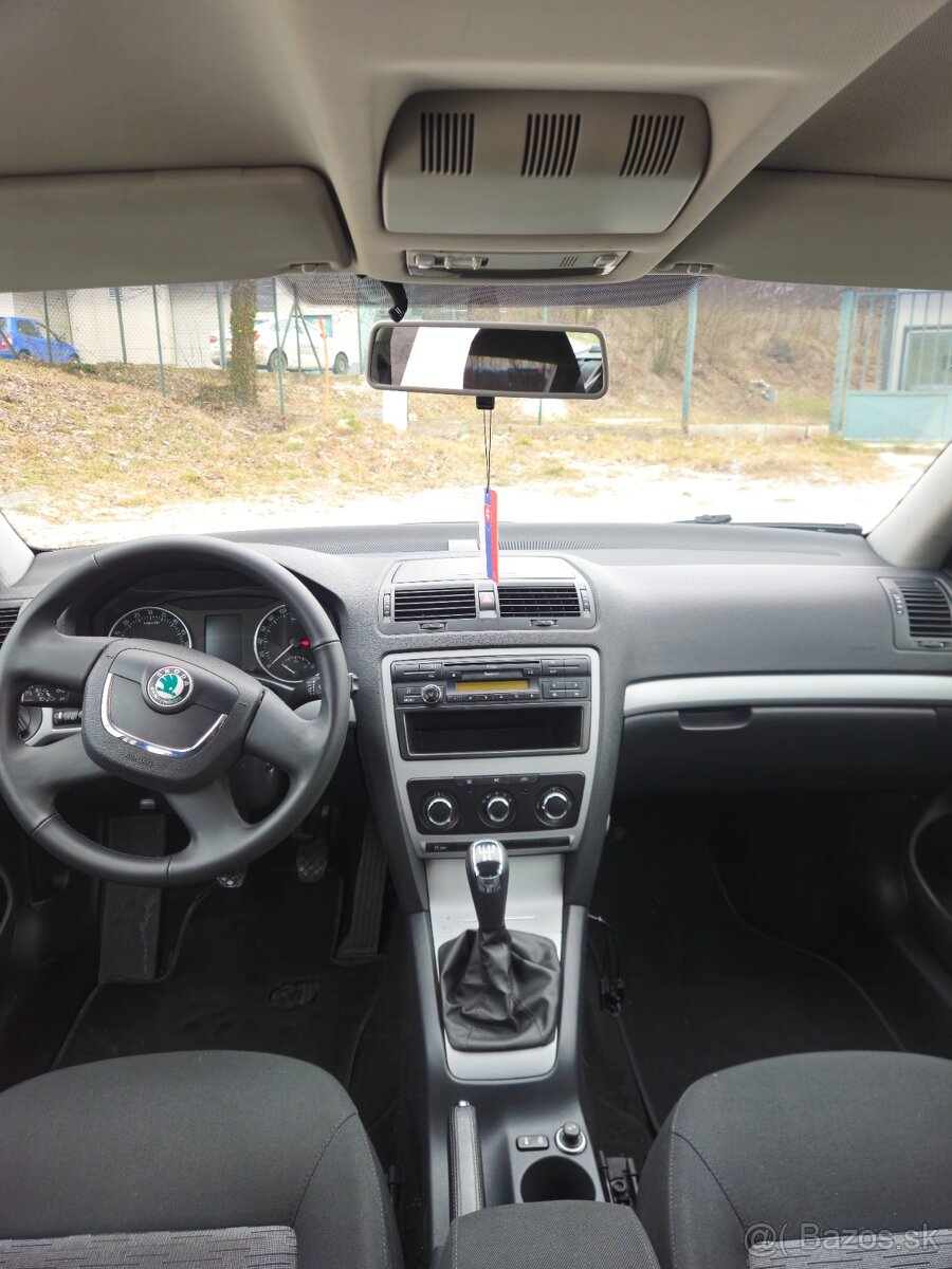 Skoda octavia 1.6tdi 77kw combi 2012 - 8