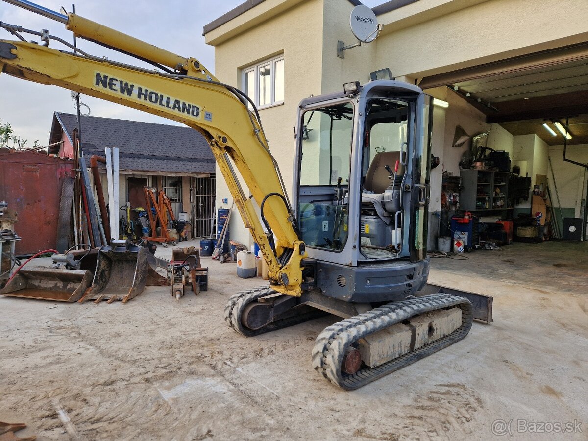 New holland -kobelco - 8