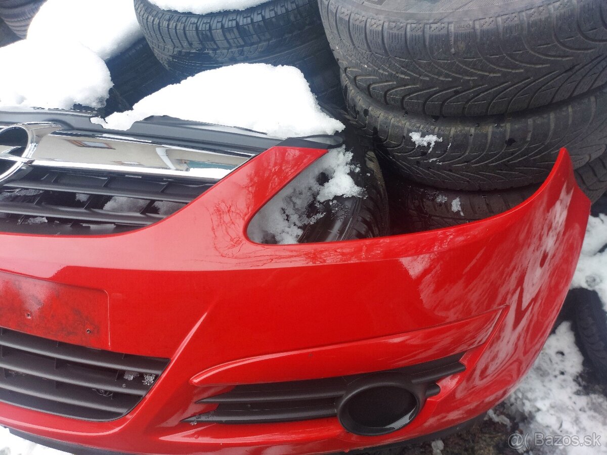 OPEL CORSA D - přední nárazník - 8