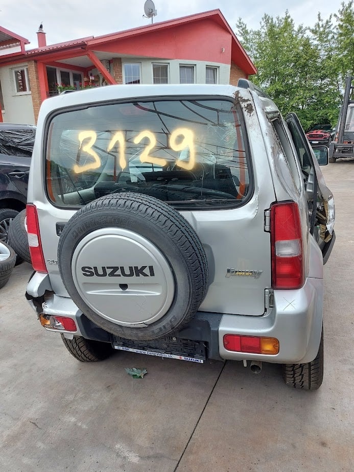 Suzuki Jimny 1,3i 62,5kw 69.500km - 8