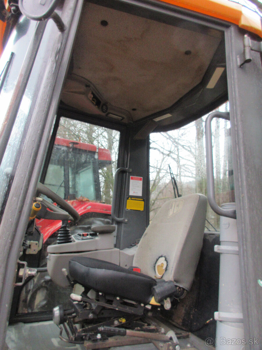 Kolový nakladač JCB 407 - 8