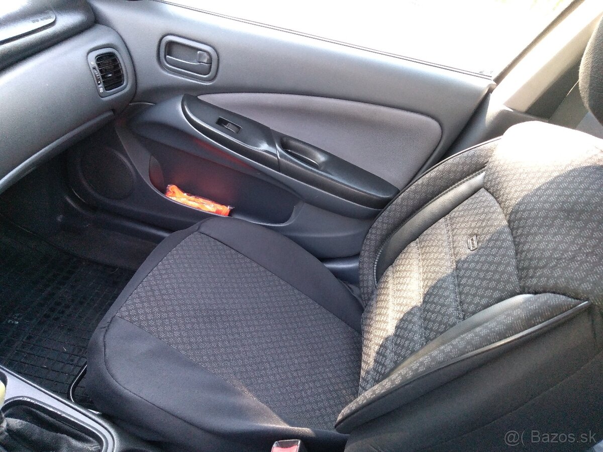 Nissan almera N16 Ročnik 2006 - 8