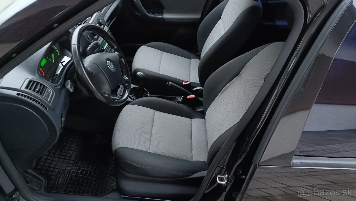 ŠKODA ROOMSTER 1.4 MPI 63 kW PLUS EDITION - 8