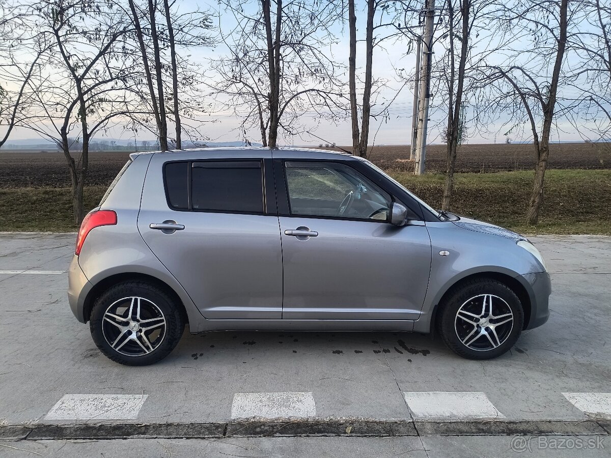 Suzuki Swift 1.3 - 8