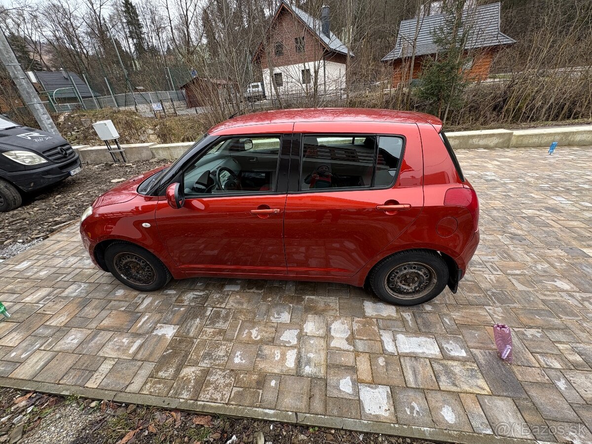 Suzuki Swift 1.3i - 8