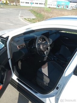 Toyota Corolla Combi 2.0 Hybrid Trek e-CVT - 8