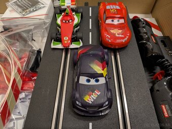 Autodráha Carrera Evolution Disney Cars 2 World Grand Prix - 8
