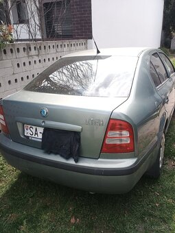 Octavia 1.6 benz 75kw - 8