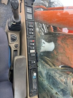 Kolesové rypadlo CASE WX145 - 8