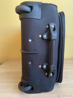 Malý cestovný kufor. - 8