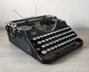 Prenosný starožitný písací stroj Continental z roku 1938 - 8