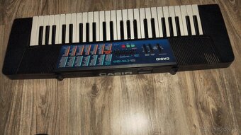 Prodám přenosné hrající klávesy Casio CTK-120 i na baterie . - 8