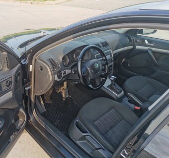 Škoda Octavia 2 facelift 1.9 tdi DSG Nova STK/EK - 8