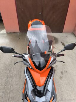 Adamoto 125 - 8
